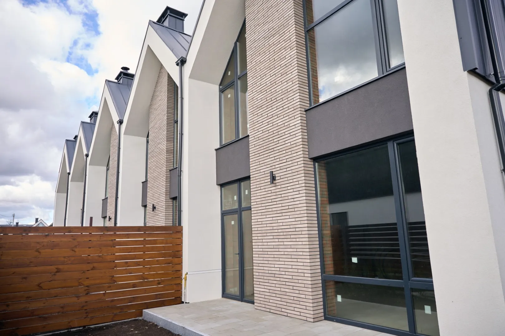 two-storey-townhouses-lined-up-next-to-another-2024-10-22-04-27-34-utc